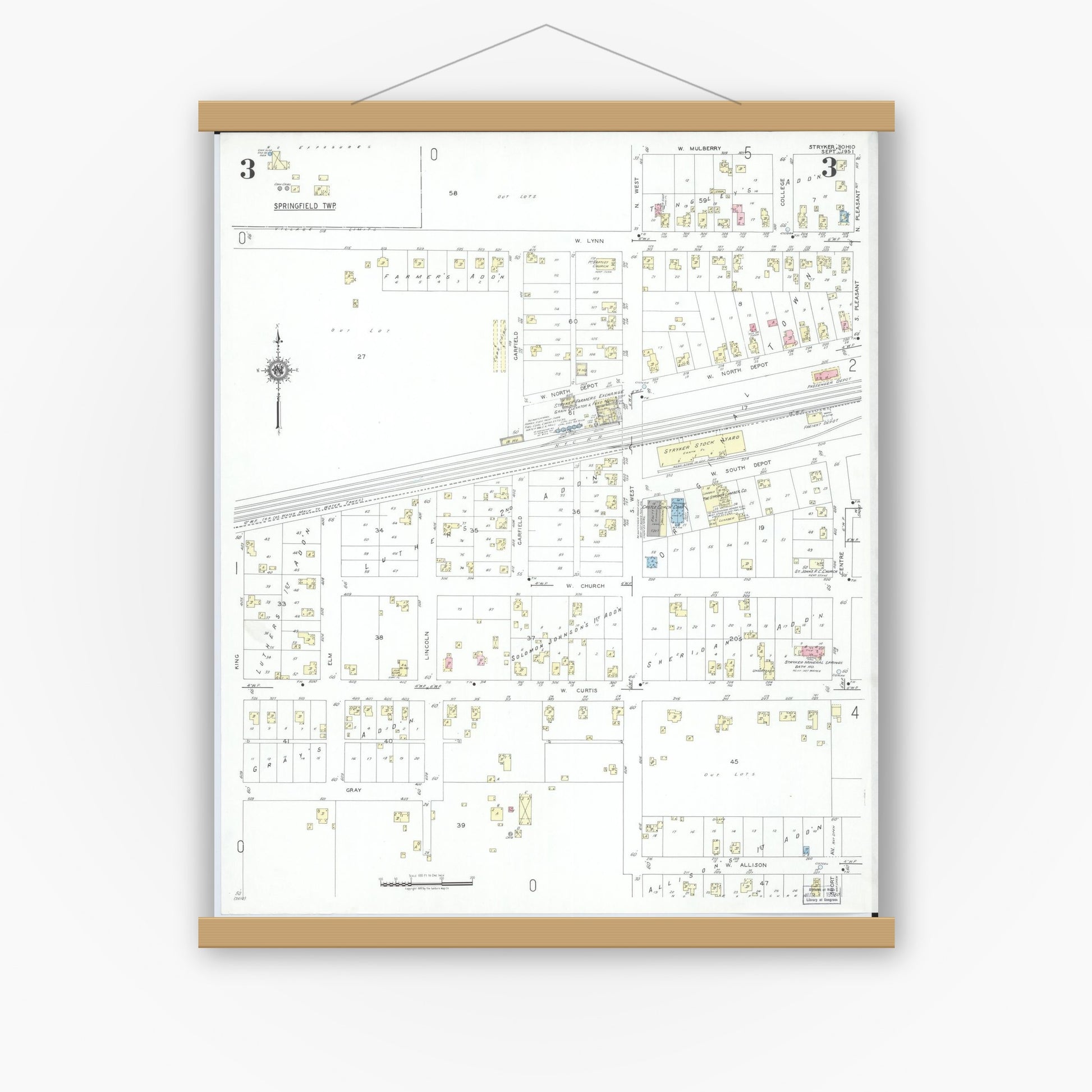 Old map wall art mockup — magnetic wood frame on white wall — Sanborn Fire Insurance Map from Stryker, Williams County, Ohio (1951), Sheet #0003