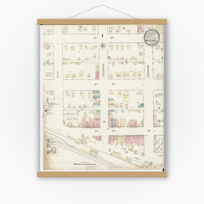 Old map wall art mockup — magnetic wood frame on white wall — Sanborn Fire Insurance Map from West Liberty, Muscatine County, Iowa (1886), Sheet #0001