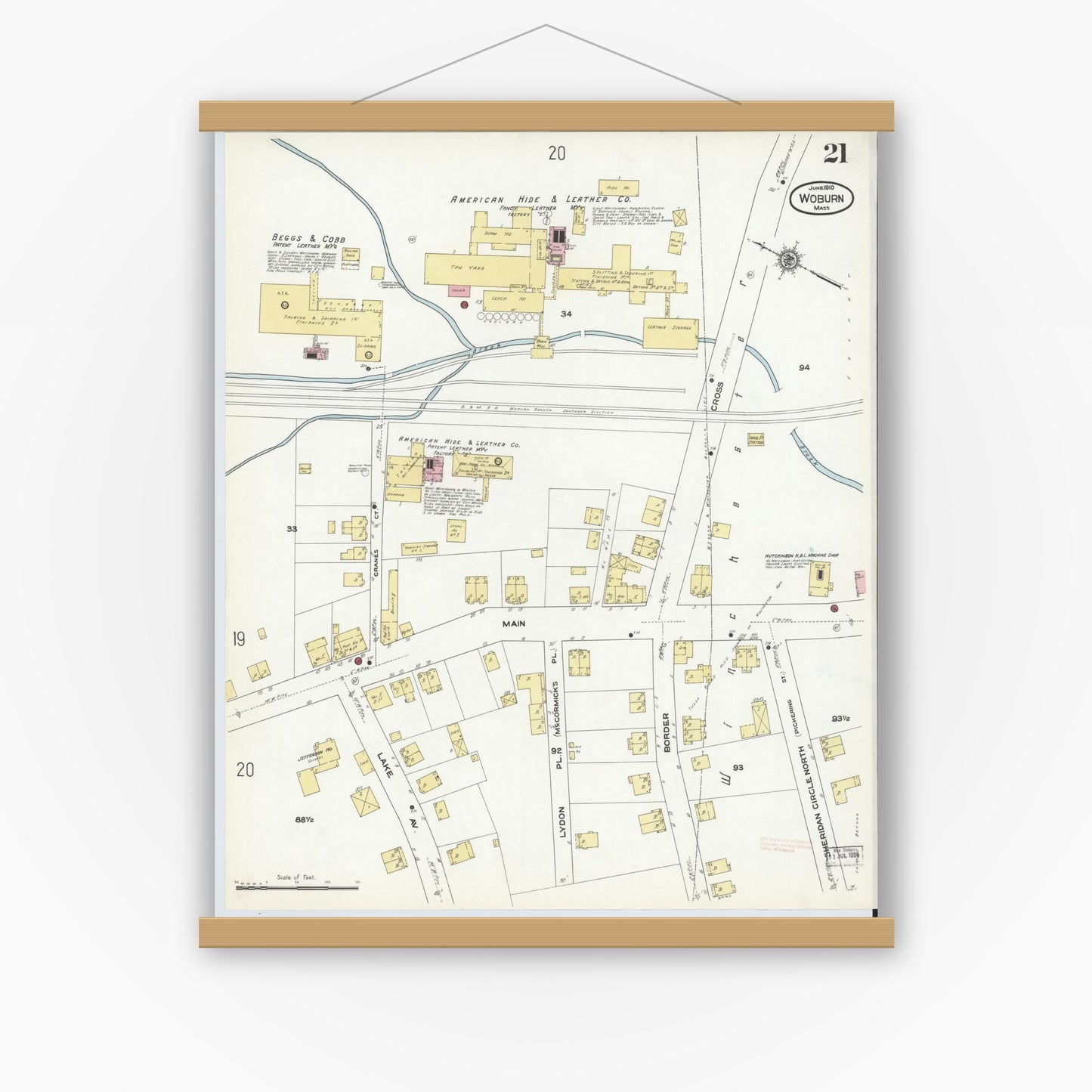 Old map wall art mockup — magnetic wood frame on white wall — Sanborn Fire Insurance Map from Woburn, Middlesex County, Massachusetts (1910), Sheet #0021