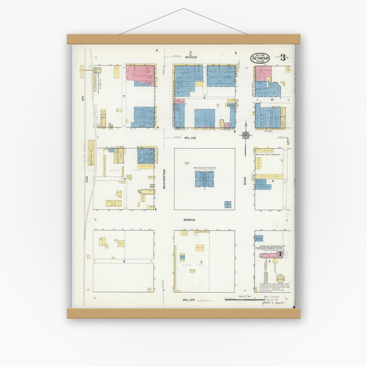 Old map wall art mockup — magnetic wood frame on white wall — Sanborn Fire Insurance Map from Seymour, Baylor County, Texas (1916), Sheet #0003