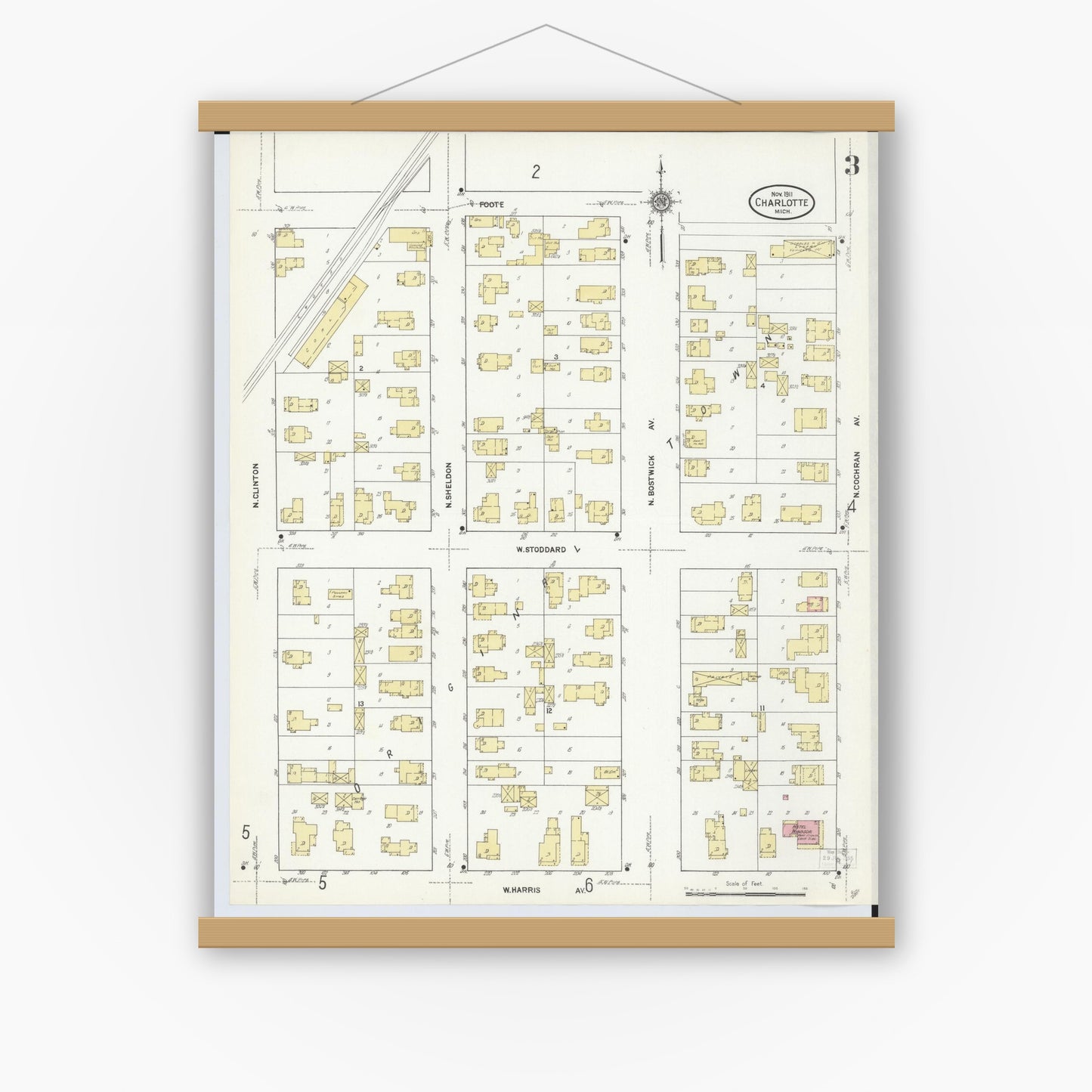 Old map wall art mockup — magnetic wood frame on white wall — Sanborn Fire Insurance Map from Charlotte, Eaton County, Michigan (1911), Sheet #0003