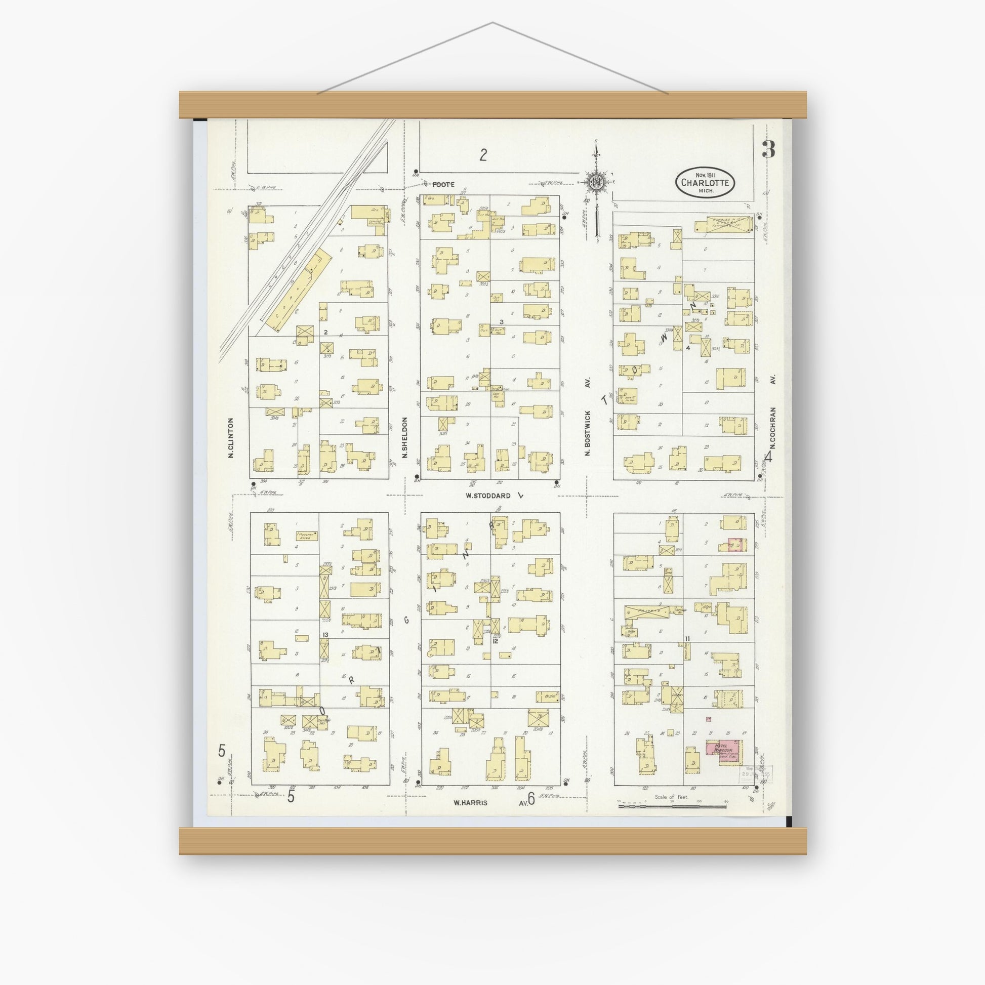 Old map wall art mockup — magnetic wood frame on white wall — Sanborn Fire Insurance Map from Charlotte, Eaton County, Michigan (1911), Sheet #0003