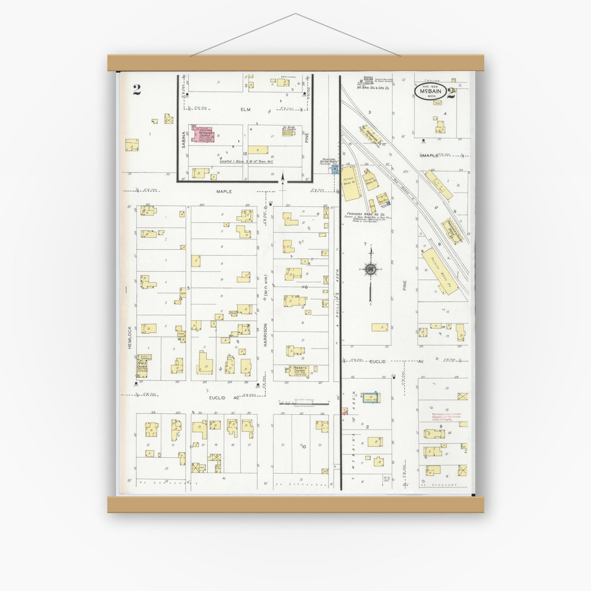 Old map wall art mockup — magnetic wood frame on white wall — Sanborn Fire Insurance Map from Mcbain, Missaukee County, Michigan (1929), Sheet #0002