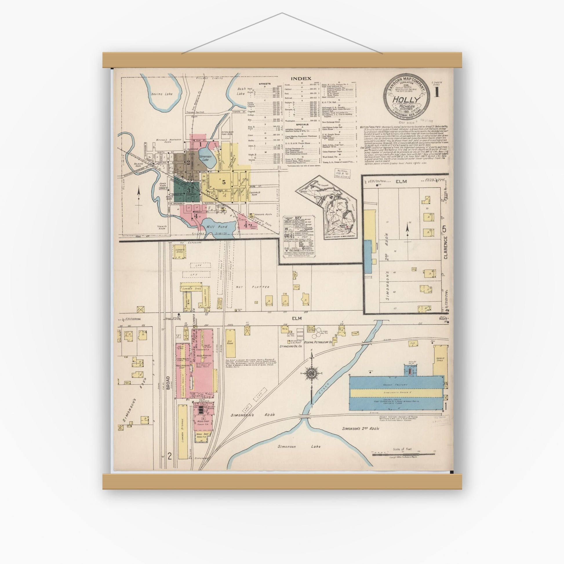 Old map wall art mockup — magnetic wood frame on white wall — Sanborn Fire Insurance Map from Holly, Oakland County, Michigan (1921), Sheet #0001
