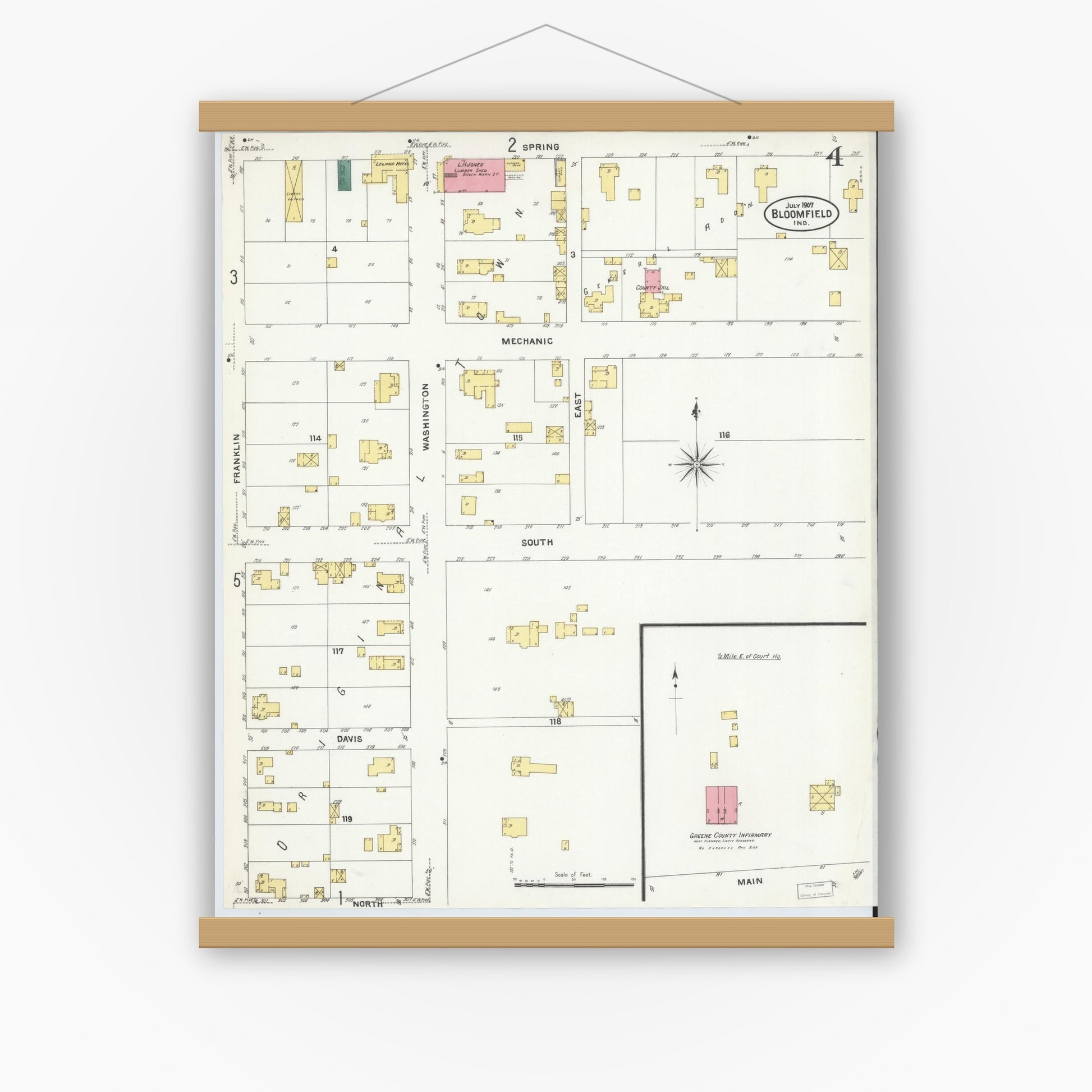 Old map wall art mockup — magnetic wood frame on white wall — Sanborn Fire Insurance Map from Bloomfield, Greene County, Indiana (1907), Sheet #0004