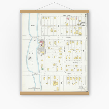 Old map wall art mockup — magnetic wood frame on white wall — Sanborn Fire Insurance Map from Austin, Mower County, Minnesota (1899), Sheet #0007
