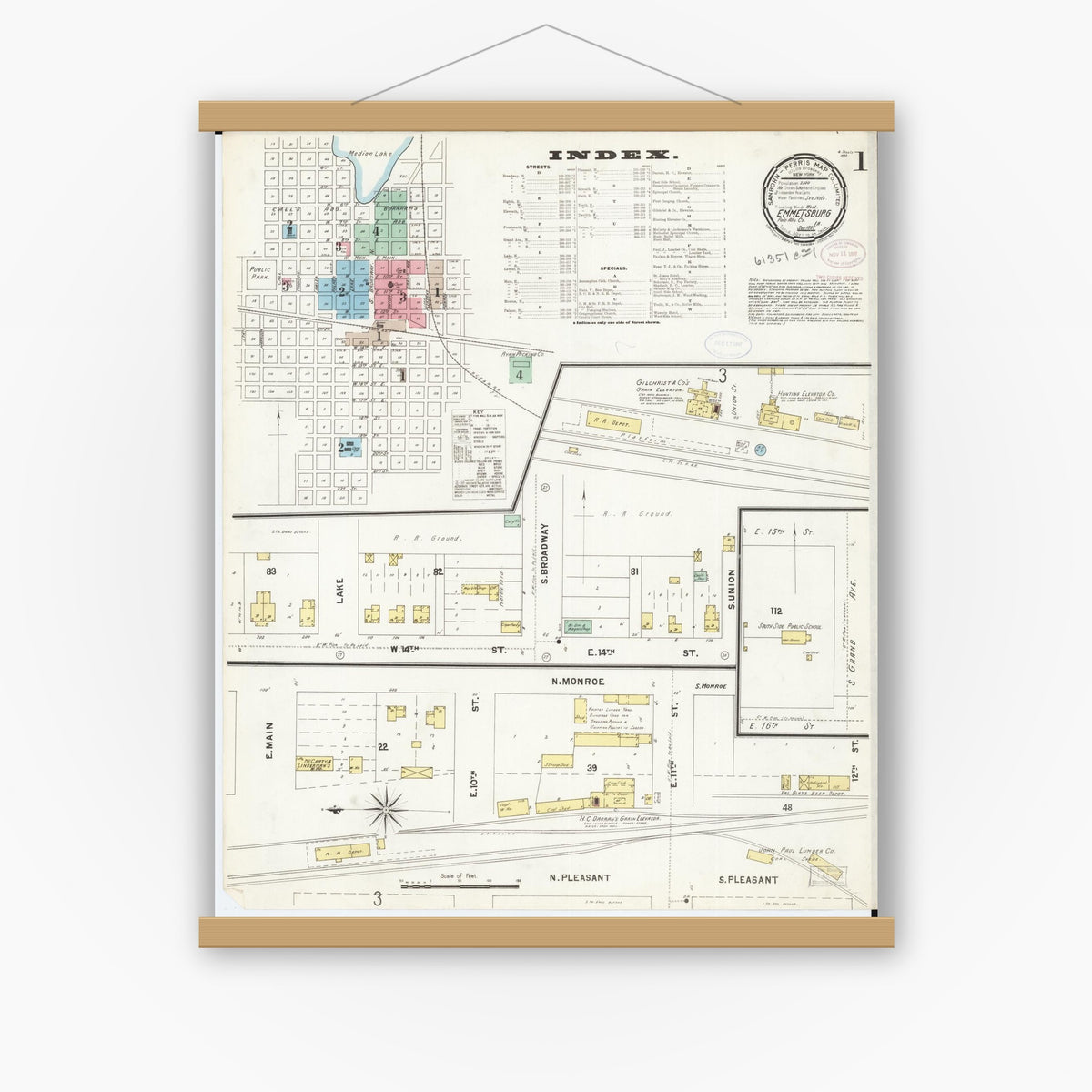 Old map wall art mockup — magnetic wood frame on white wall — Sanborn Fire Insurance Map from Emmetsburg, Palo Alto County, Iowa (1897) â€” Complete Set