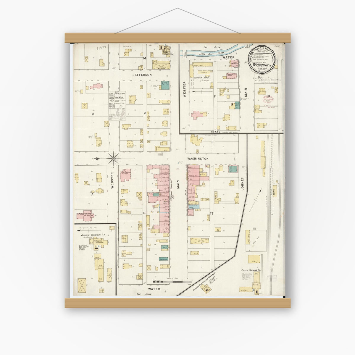 Old map wall art mockup — magnetic wood frame on white wall — Sanborn Fire Insurance Map from Wyoming, Jones County, Iowa (1895), Sheet #0001