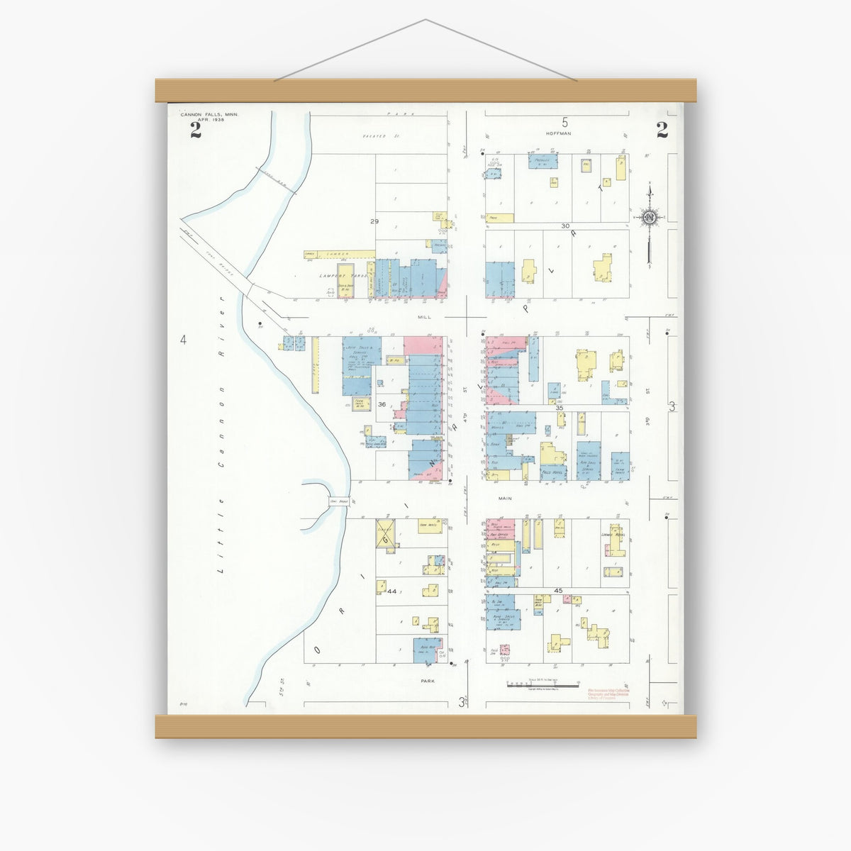 Old map wall art mockup — magnetic wood frame on white wall — Sanborn Fire Insurance Map from Cannon Falls, Goodhue County, Minnesota (1938), Sheet #0002