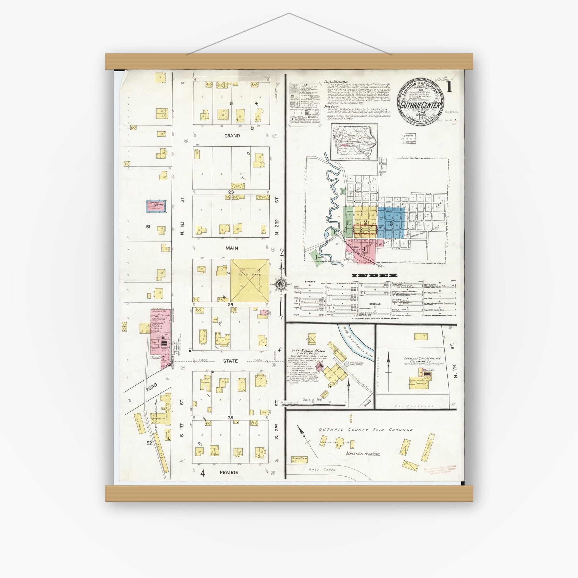 Old map wall art mockup — magnetic wood frame on white wall — Sanborn Fire Insurance Map from Guthrie Center, Guthrie County, Iowa (1916) â€” Complete Set