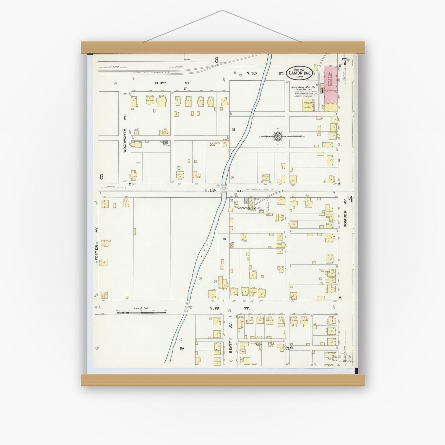 Old map wall art mockup — magnetic wood frame on white wall — Sanborn Fire Insurance Map from Cambridge, Guernsey County, Ohio (1909), Sheet #0007