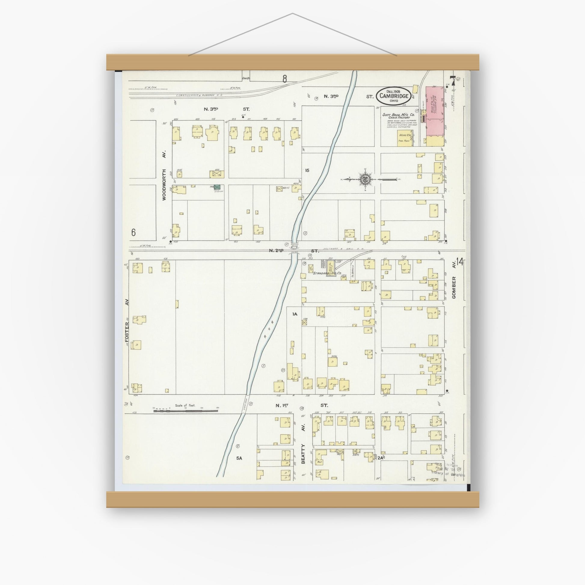 Old map wall art mockup — magnetic wood frame on white wall — Sanborn Fire Insurance Map from Cambridge, Guernsey County, Ohio (1909), Sheet #0007