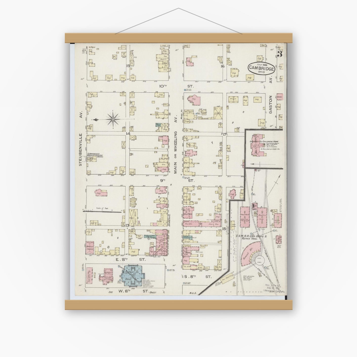 Old map wall art mockup — magnetic wood frame on white wall — Sanborn Fire Insurance Map from Cambridge, Guernsey County, Ohio (1886), Sheet #0003