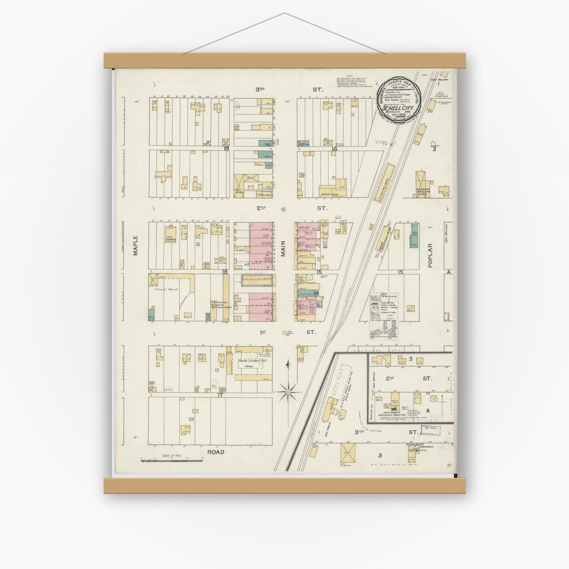 Old map wall art mockup — magnetic wood frame on white wall — Sanborn Fire Insurance Map from Schell City, Vernon County, Missouri (1892), Sheet #0001