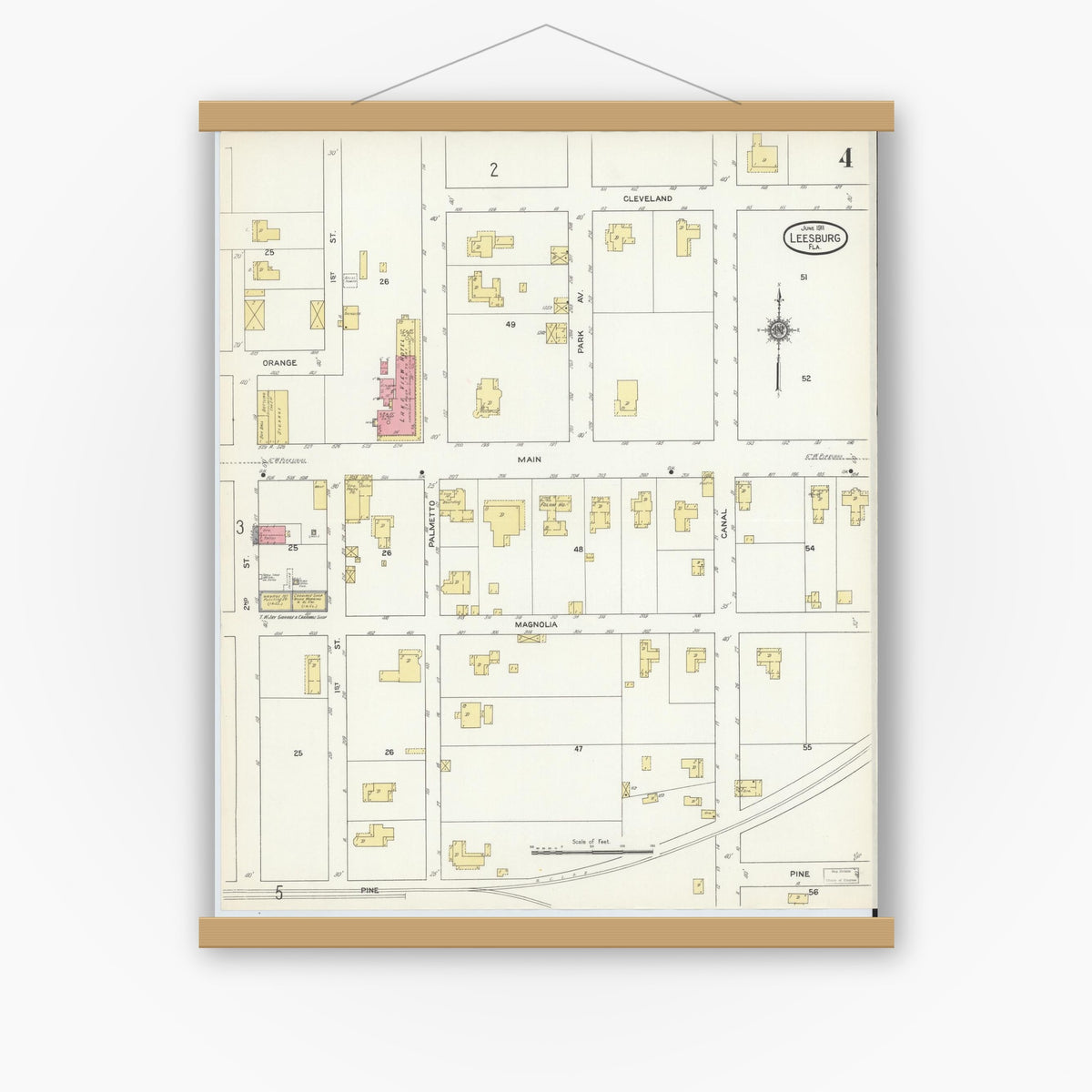 Old map wall art mockup — magnetic wood frame on white wall — Sanborn Fire Insurance Map from Leesburg, Lake County, Florida (1911), Sheet #0004