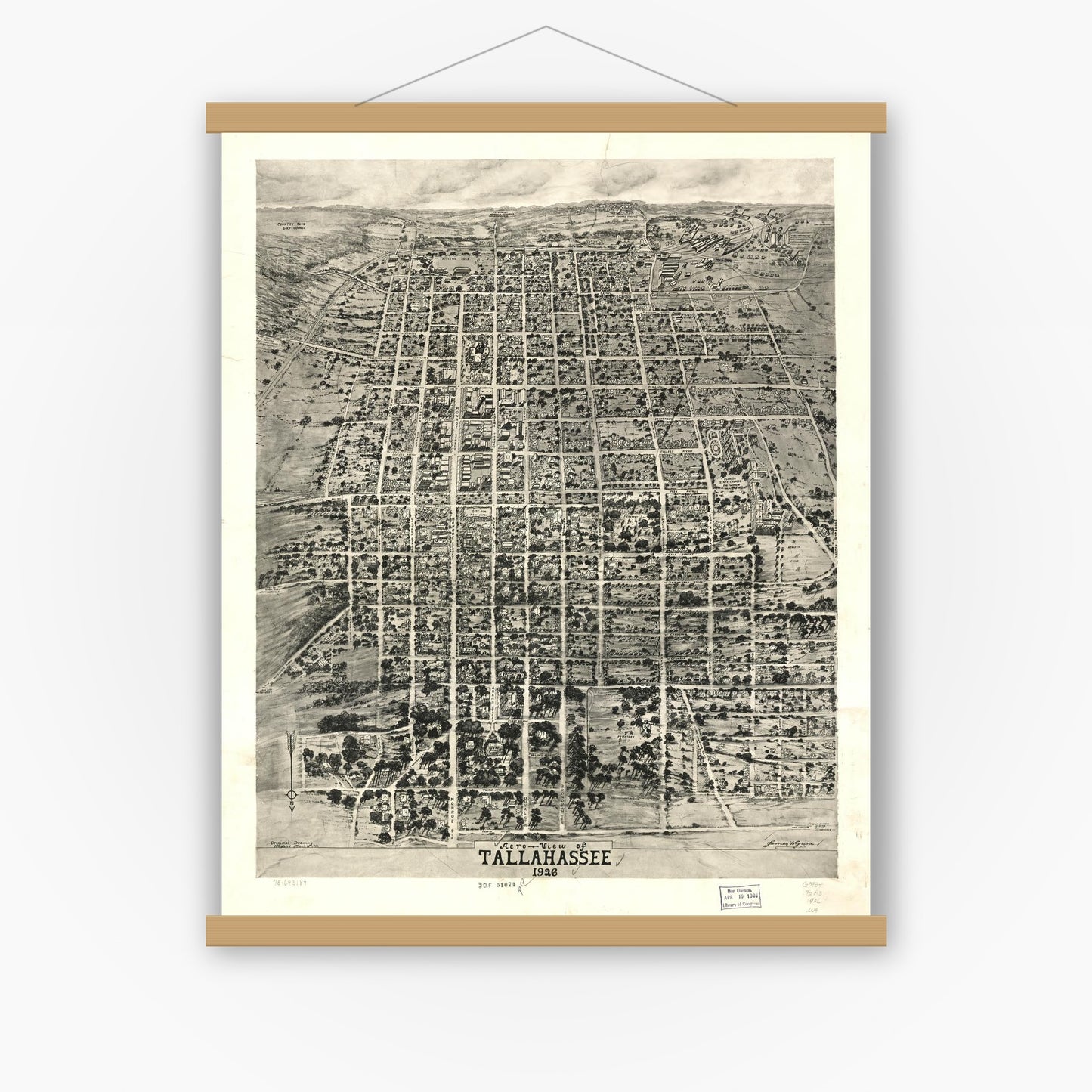 Old map wall art mockup — magnetic wood frame on white wall — Aero-view of Tallahassee 1926. (1926)