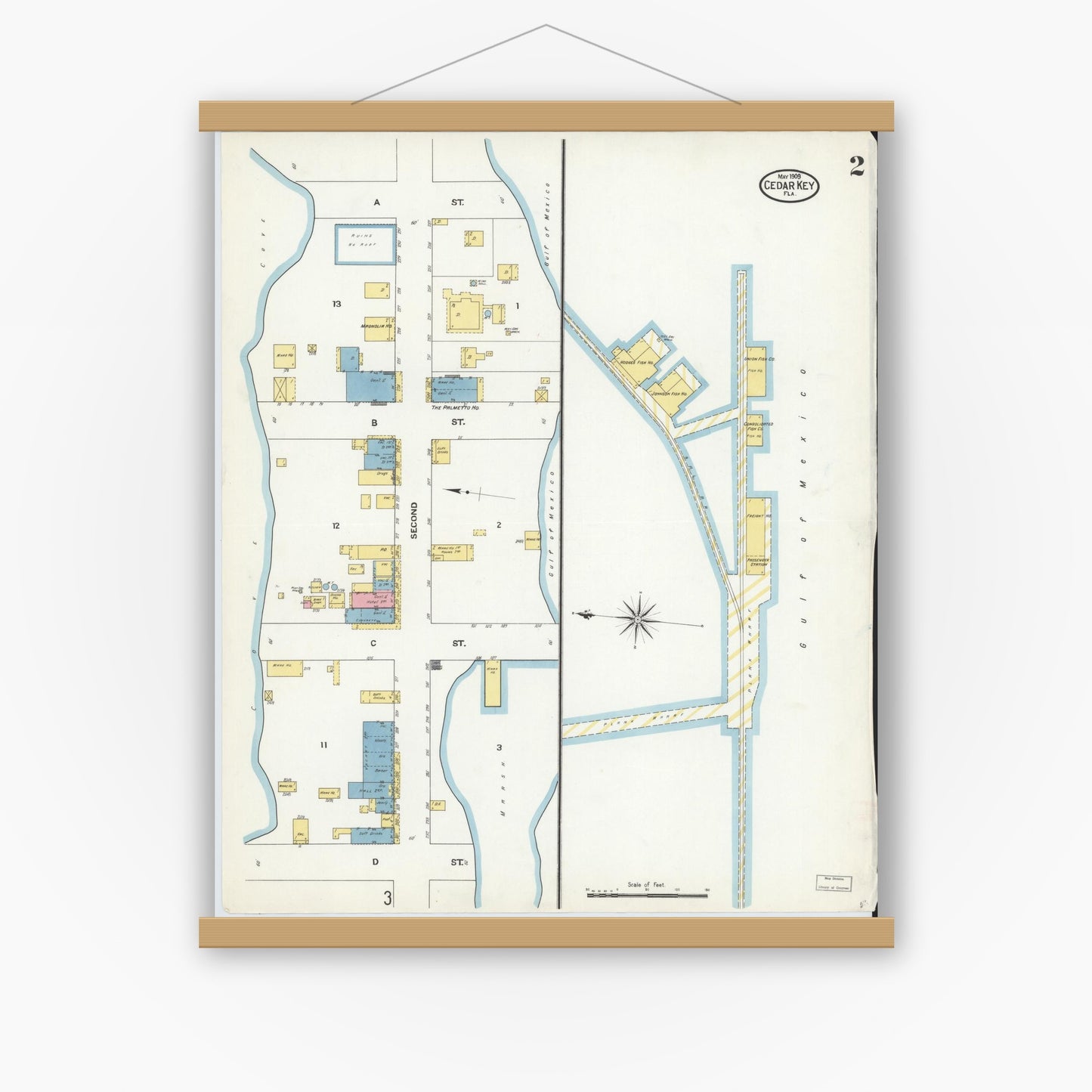 Old map wall art mockup — magnetic wood frame on white wall — Sanborn Fire Insurance Map from Cedar Key, Levy County, Florida (1909), Sheet #0002