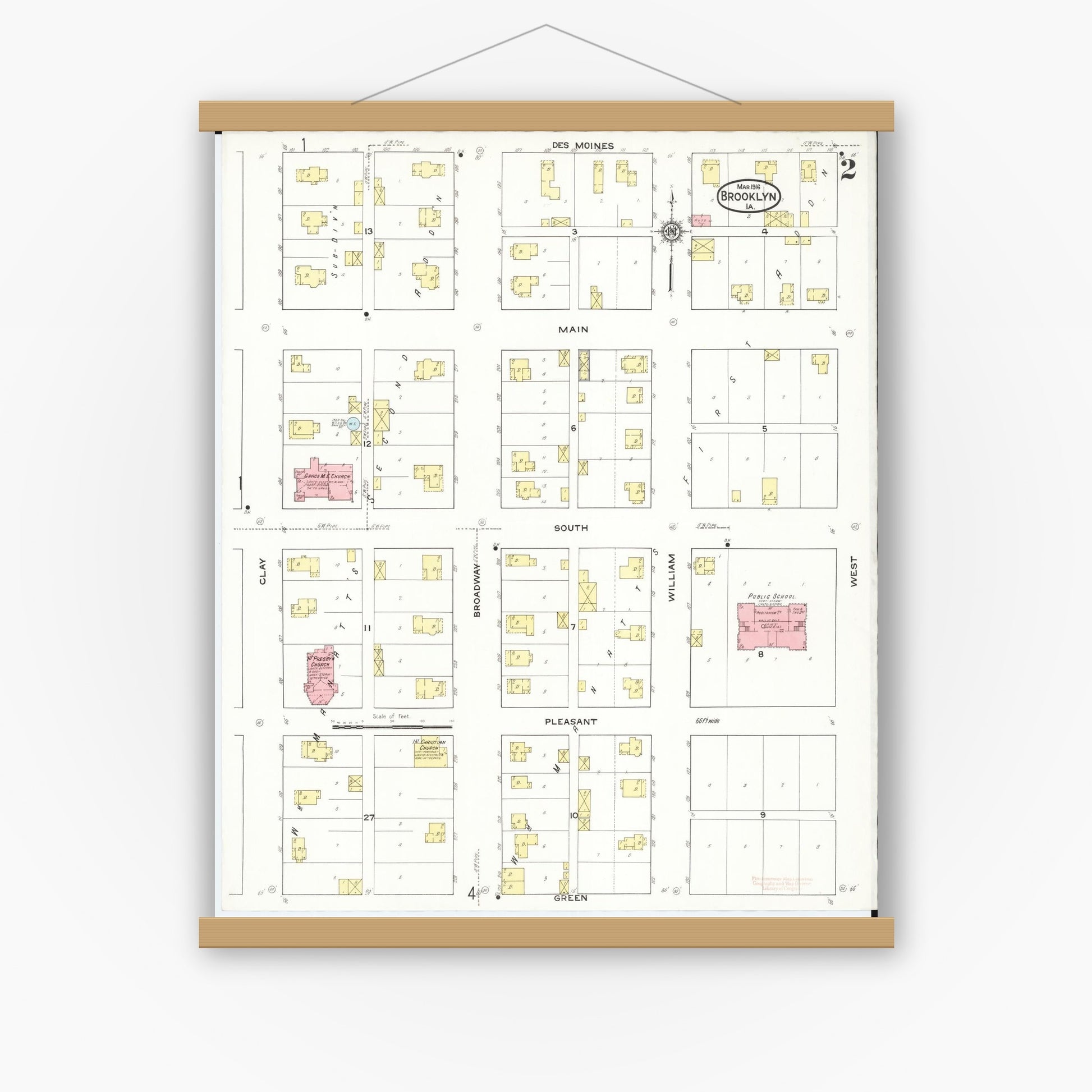 Old map wall art mockup — magnetic wood frame on white wall — Sanborn Fire Insurance Map from Brooklyn, Poweshiek County, Iowa (1916), Sheet #0002