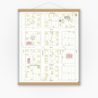 Old map wall art mockup — magnetic wood frame on white wall — Sanborn Fire Insurance Map from Brooklyn, Poweshiek County, Iowa (1916), Sheet #0002