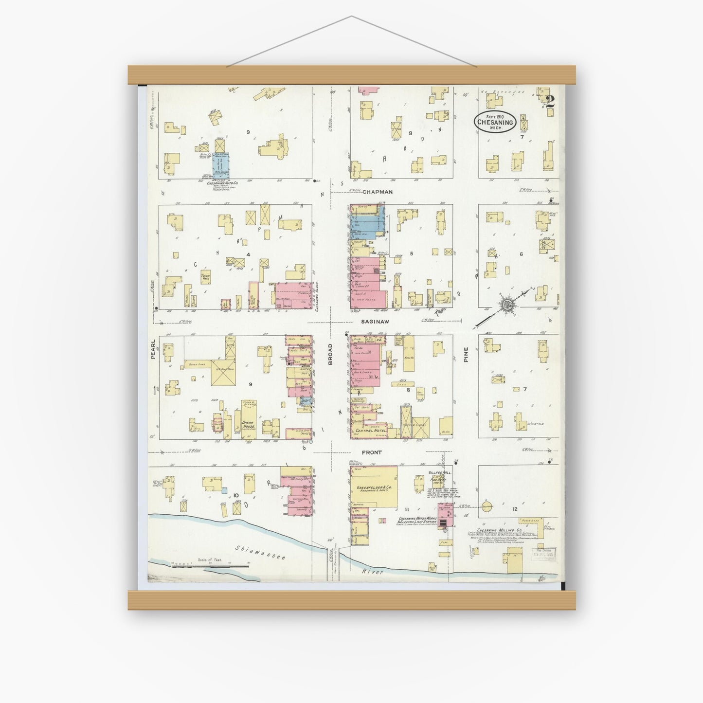 Old map wall art mockup — magnetic wood frame on white wall — Sanborn Fire Insurance Map from Chesaning, Saginaw County, Michigan (1910), Sheet #0002