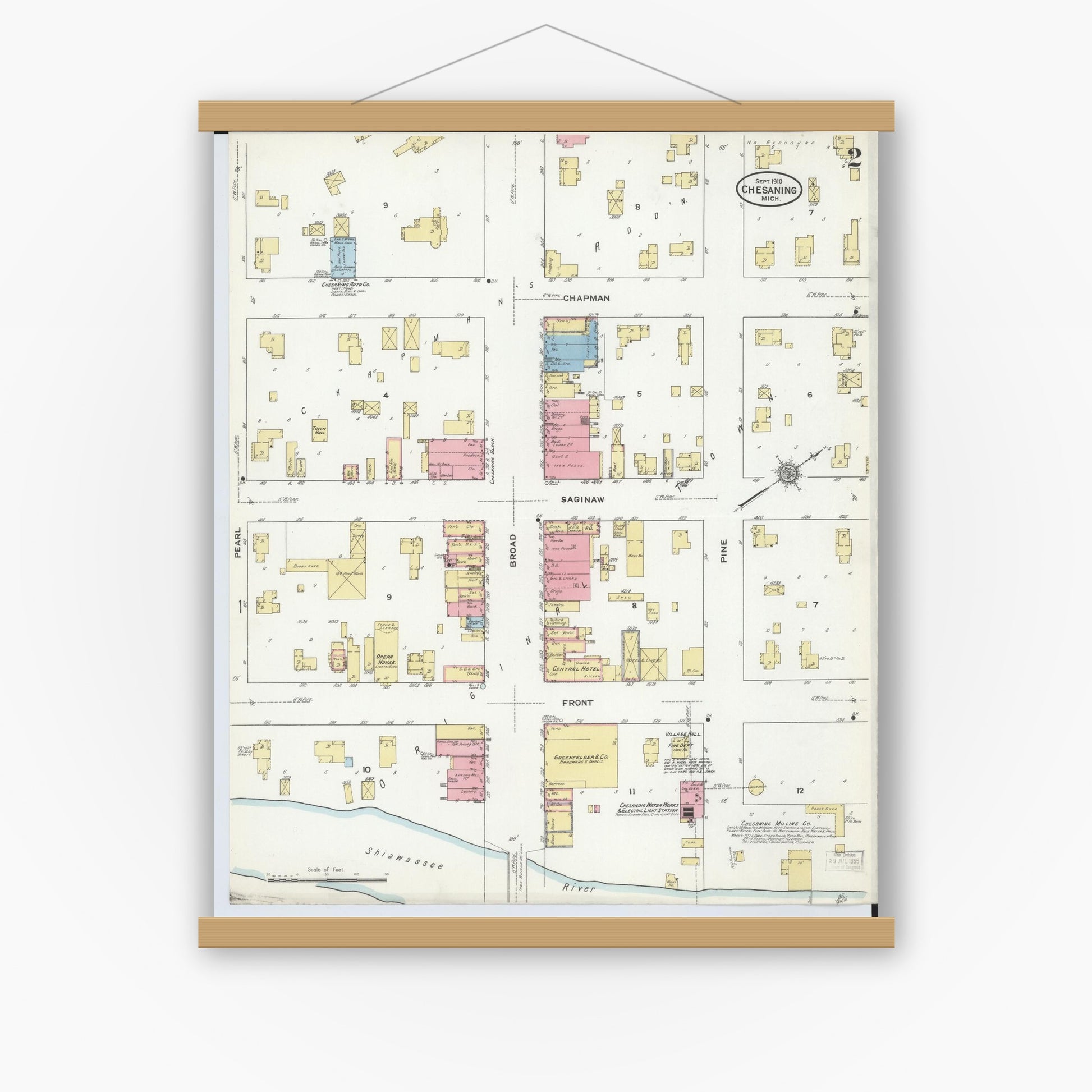 Old map wall art mockup — magnetic wood frame on white wall — Sanborn Fire Insurance Map from Chesaning, Saginaw County, Michigan (1910), Sheet #0002