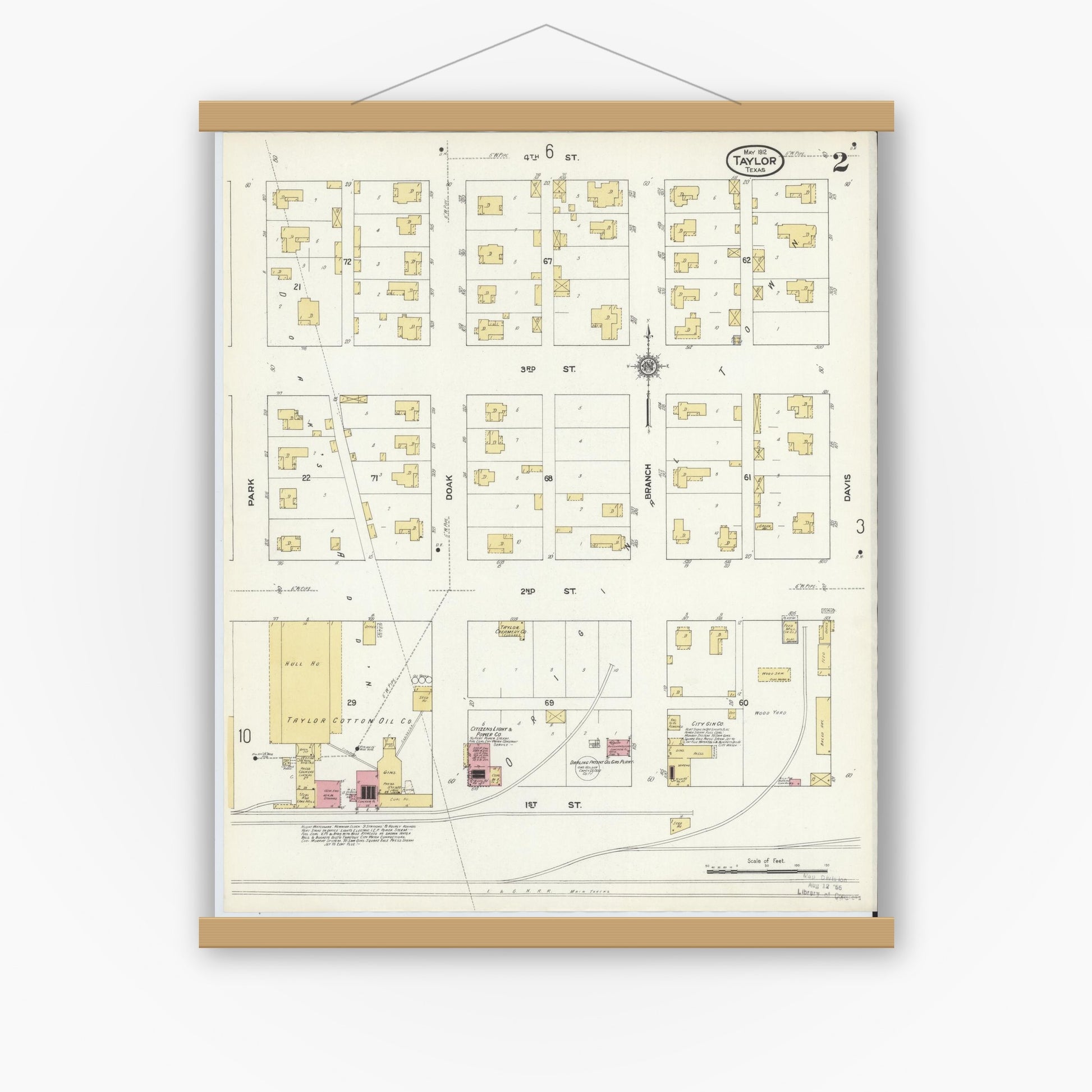 Old map wall art mockup — magnetic wood frame on white wall — Sanborn Fire Insurance Map from Taylor, Williamson County, Texas (1912), Sheet #0002