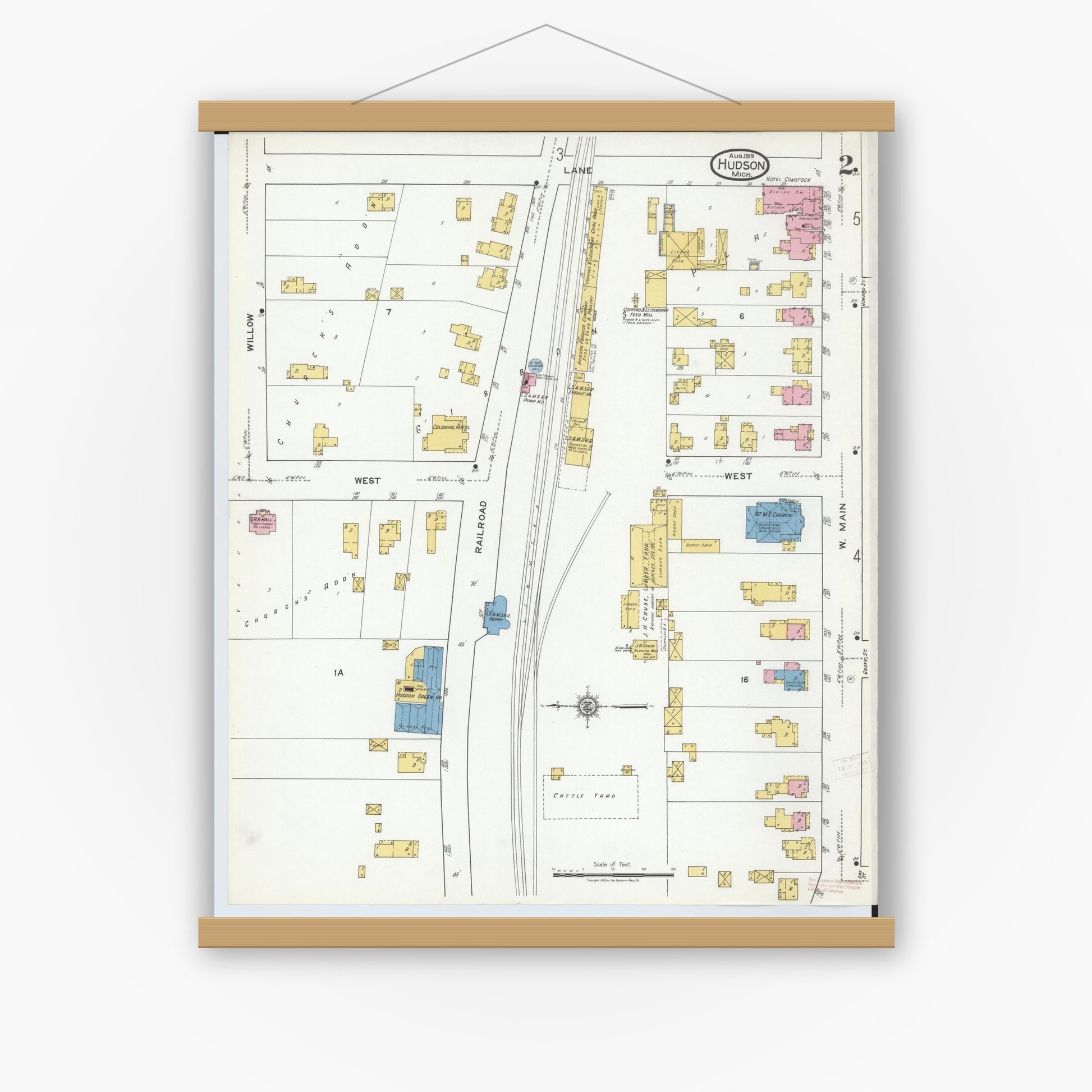 Old map wall art mockup — magnetic wood frame on white wall — Sanborn Fire Insurance Map from Hudson, Lenawee County, Michigan (1919), Sheet #0002