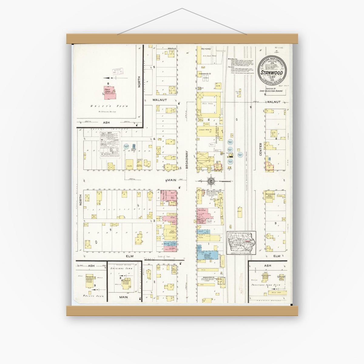 Old map wall art mockup — magnetic wood frame on white wall — Sanborn Fire Insurance Map from Stanwood, Cedar County, Iowa (1915), Sheet #0001