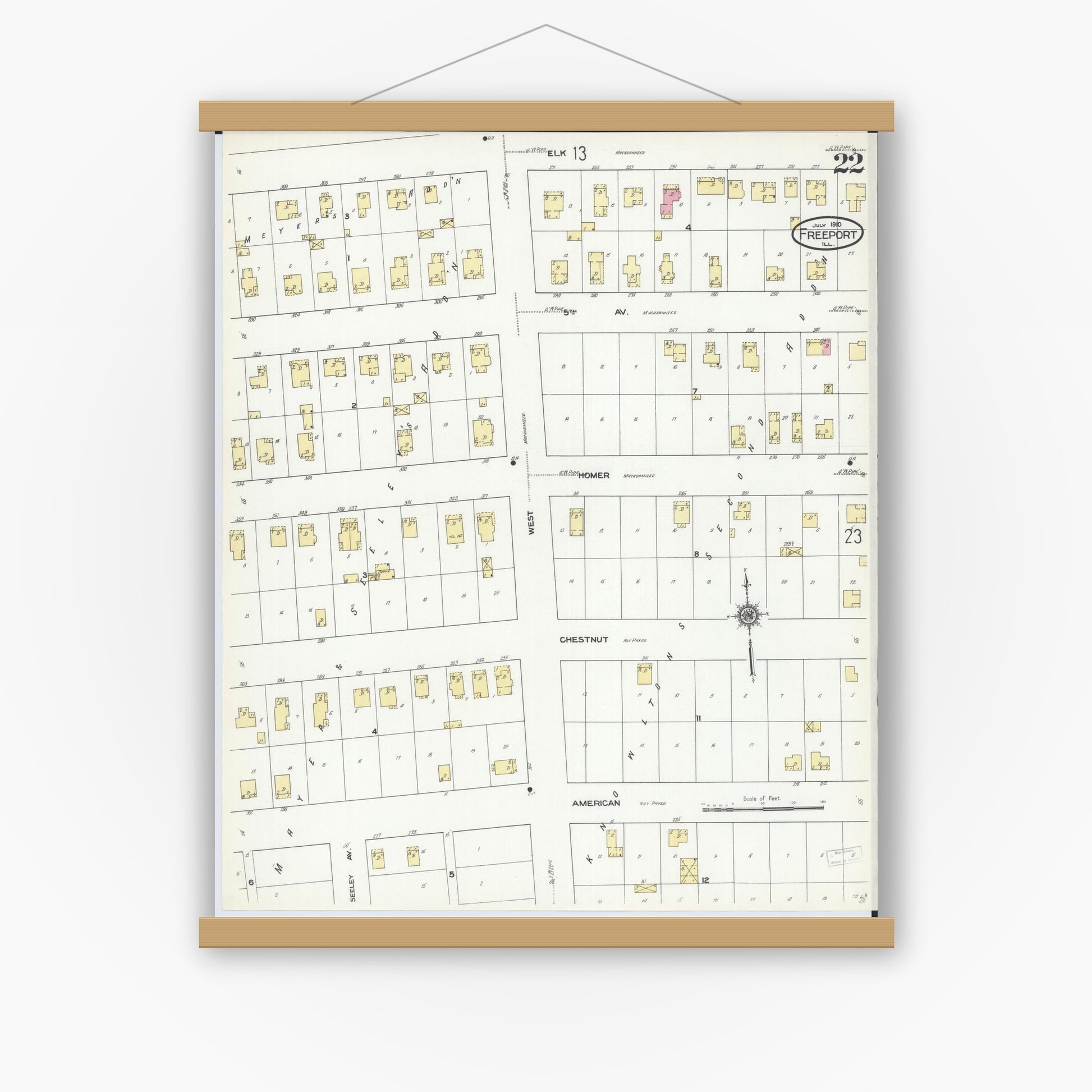 Old map wall art mockup — magnetic wood frame on white wall — Sanborn Fire Insurance Map from Freeport, Stephenson County, Illinois (1910), Sheet #0022